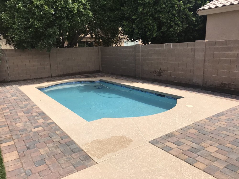 Freshly installed concrete backyard patio.